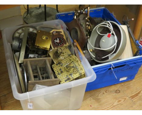 Various mantel clock parts and cases, and a quantity of clock movements, as viewed 