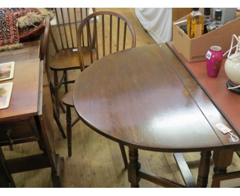 An oak dining set, gateleg table, 3ft., set of four stick-back chairs