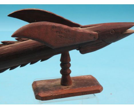 A Miro wood Souvenir From Pitcairn, each fin with impressed stamps, on stamped plinth, underside inscribed Pitcairn Island, S