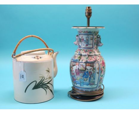 A 19th century Canton-enamelled baluster vase, painted with figures and bright flowers, 13in. - cracked; converted to electri
