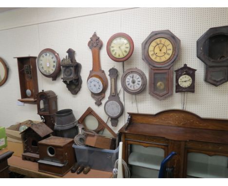 An assortment of clock and barometer cases, as viewed 