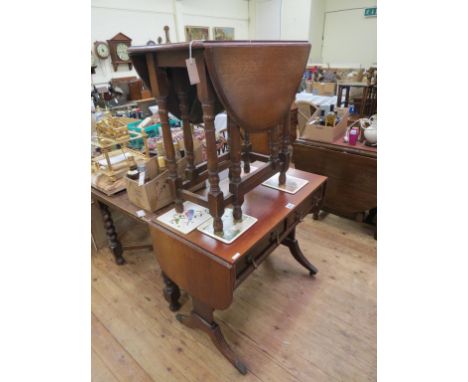 A solid, dark oak draw-leaf dining table, on barley-twist underframe, 3ft., together with a medium oak gateleg table, 2ft. 5i