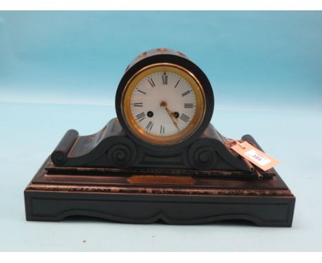 A Victorian black slate mantel clock, enamelled dial and French bell-striking movement, brass plaque dated 1884, with pendulu