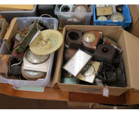 A large quantity of mantel clock parts, as viewed 