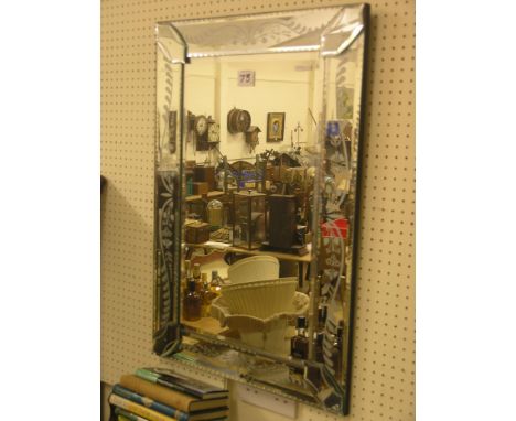 A wrought metal lamp stand, stem with two shelves, and an Art Deco-style frameless mirror with engraved borders, 2ft. 6in. hi