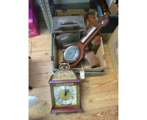A period-style mahogany bracket clock, with elaborate brass mounts, four various mantel clocks and a wheel barometer