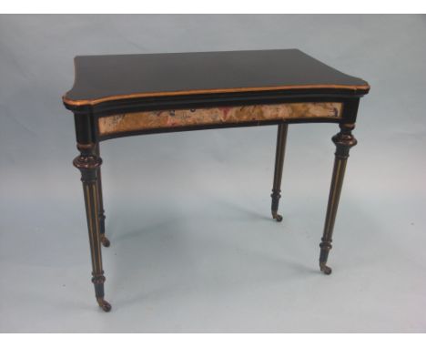 A Victorian ebonised mahogany card table, later-applied with early 18th century crewel-work to frieze, rear two legs supporti