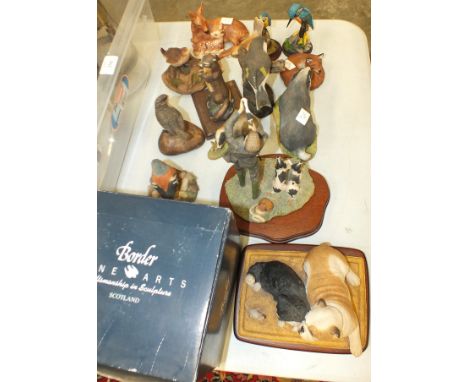 A collection of commemorative plates, composite bird and animal figures by Arden and a Goebel deer and faun.