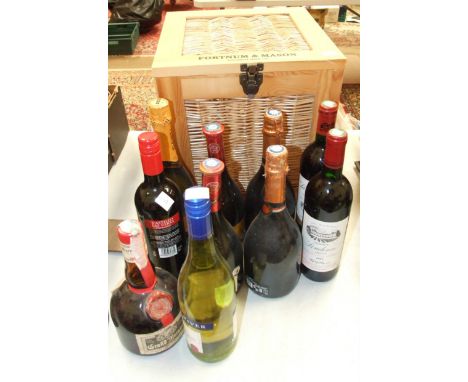 A Fortnum &amp; Mason wood and wicker hamper box, various bottles of red wine and sparkling wine and one bottle of grand Marn