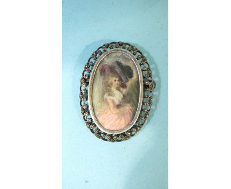 A small oval miniature painted with a Gainsborough-style portrait of a woman, in white metal and marcasite brooch mount, 40mm