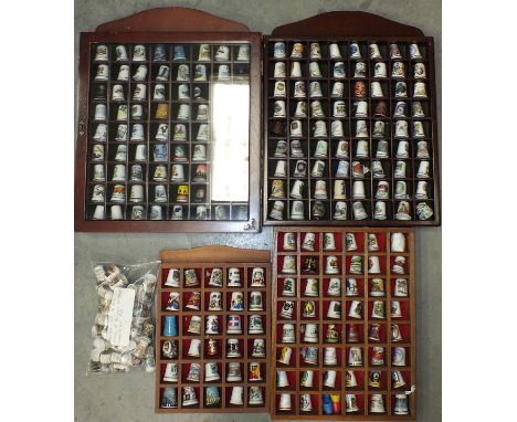 A large collection of modern ceramic thimbles, approximately 270.