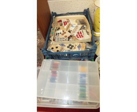 A large collection of vintage buttons on cards, other haberdashery, etc.