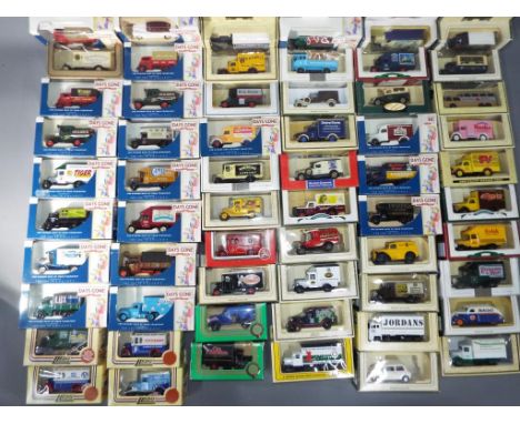 Diecast model vehicles - Lledo - a lot consisting of 60 scale model vans, cars and buses, models appear to be in mint conditi