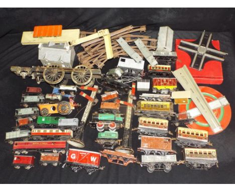 Hornby, Hornby Dublo and others - A large quantity of predominately unboxed Hornby rolling stock, carriages, track and access