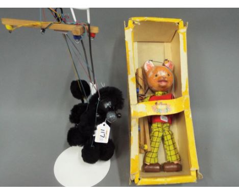 Pelham Puppets - a Pelham Rupert The Bear puppet with box and a Pelham Black Puddle puppet with red bow, unboxed [2].