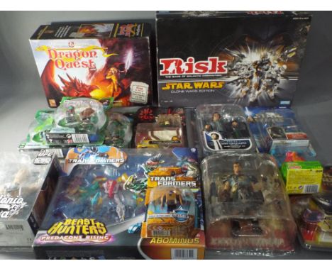 Action Heroes - a large collection of Action Figures from Star Wars, Green Lantern, Transformers and others also included in 