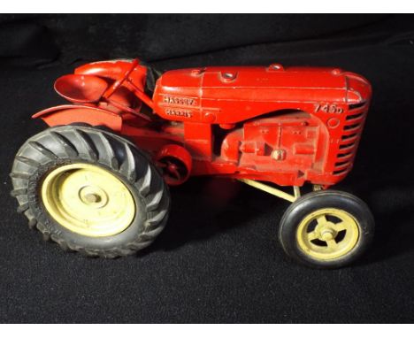 Matchbox Lesney - An unboxed large scaled Matchbox Lesney Massey Harris 745D Farm Tractor. The model has a red body and cream