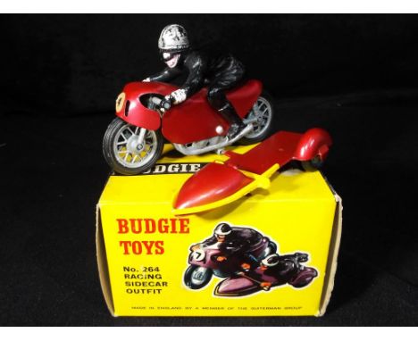 Budgie Toys - A boxed Budgie Toys No.264 Racing Sidecar outfit. The model is in metallic red with metallic red sidecar and ye