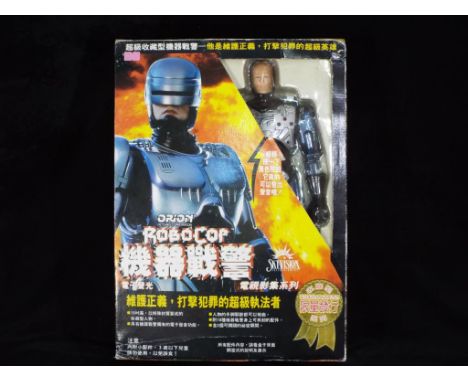 Toy Island, Orion Toys, Skyvision  - A boxed 1995 Japanese Imported 15" Toy Island Robocop Action Figure . The figure appears