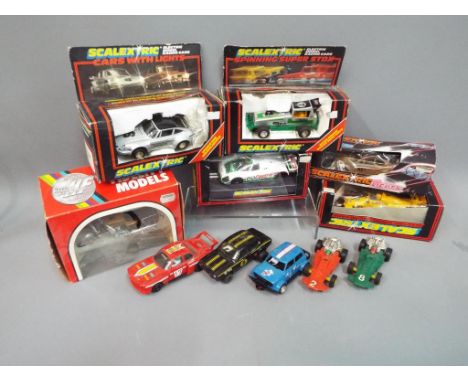 Scalextric - a collection of Scalextric model cars to include Lotus Honda Turbo C.434, boxed, a Ford Escort with lights C.287