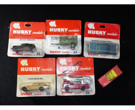 Husky Models - Five carded and one loose Husky Models 1:64 scale diecast model vehicles. Lot includes No.36 Simon Snorkel Fir