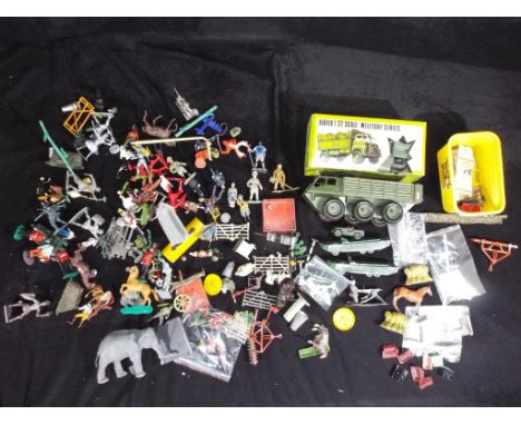 Airfix, Britains, Lone Star, Herald and others - a large quantity of metal and plastic civilain and military vehicles in vari