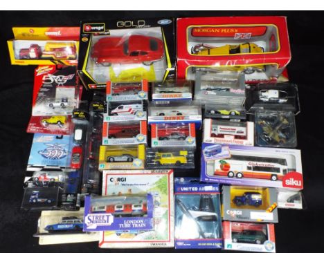 Johnny Lightning, Detail Cars, Burago, Cararama and others - Approximately 30 boxed diecast and plastic model vehicles in var