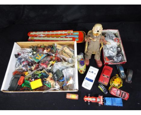 San, Matchbox, Britains and others - a mixed lot of vintage tinplate, diecast, plastic toys and accessories, the lot includes