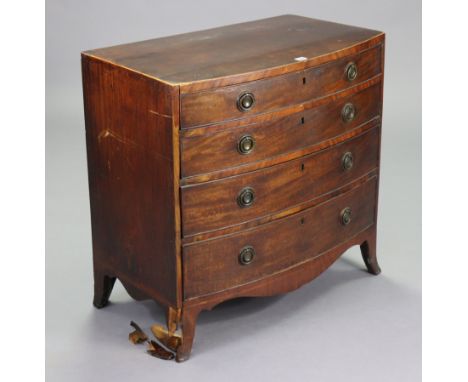 A 19th century inlaid-mahogany small bow-front chest fitted four long graduated drawers with brass ring handles, &amp; on bra