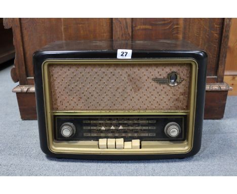 A Bush valve radio in a brown Bakelite case (Type VHF 61); &amp; a Stanton laboratory balance (model A49).