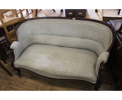 A Victorian rosewood upholstered sofa