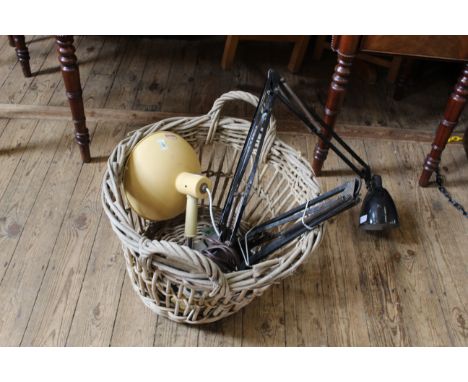 A vintage wicker basket with two vintage anglepoise lamps and a Pifco heat lamp