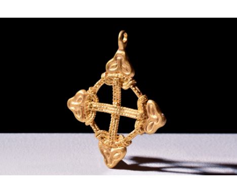Ca. 900-1000 AD.A Viking gold cross pendant. Elaborately applied grandulation, four sylised beast heads at each terminal with