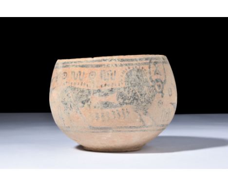 Ca. 3000-2500 BC.A terracotta bowl with a deep basin and wide mouth. The exterior is adorned with a depiction of a zebu bull 