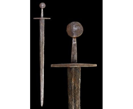 Ca. 1250-1350 AD.An iron sword of Oakshott type 'J'. With a double-edged, bevelled and pointed blade with a shallow groove, s
