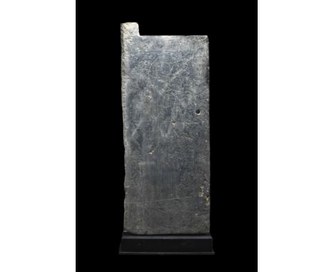 Ca. 202 BC-220 AD.A rectangular door, depicting a stylised woman with delicately incised broad lips, long aquiline nose, and 