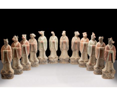 Ca. 618-907 AD.A set of twelve terracotta zodiac animals, each meticulously fashioned, and attired in resplendent court robes