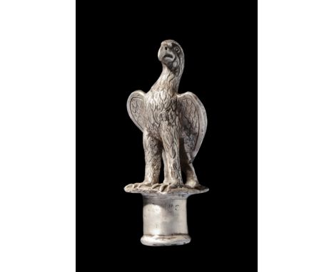 Imperial Period, Ca. 100-300 AD.A rare silver battle standard finial depicting an eagle on a short pedestal. The eagle is dep