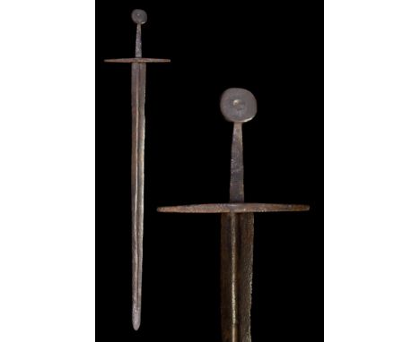 Ca. 1025-1380 AD.A stunning iron sword Oakshott type ‘G’, with a wide blade almost parallel that tapers down to a sharpish po