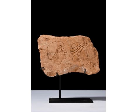 Egypt, New Kingdom, late 18th-early 19th Dynasty, Ca.1300 BC.A carved limestone graffito depicting two male heads, with style