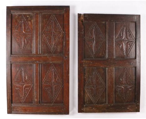 Two 17th Century oak panels, each panel set with four lozenge and leaf carved panels, 58cm wide, 91cm high and 58cm wide, 100