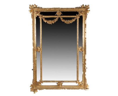 19th Century gilt gesso wall mirror, the central rectangular mirror plate with foliate spandrels and mirror panel surround, 1