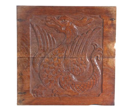 19th Century relief carved oak panel portraying a cockatrice, 46cm x 47cm&nbsp;