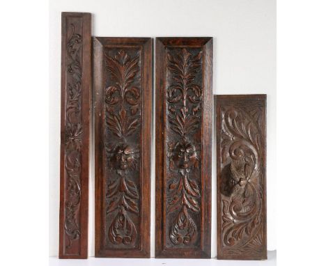 Pair of 19th Century oak panels with carved feathered faces, an 18th Century panel and a further 19th Century example, all wi