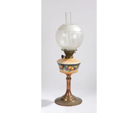 Made In England oil lamp, with clear glass chimney and etched clear glass globe form shade, the reservoir with fruit decorati