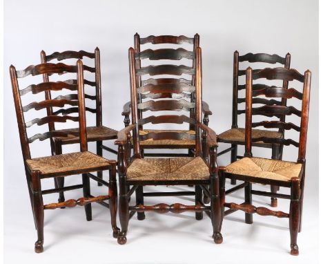 Matched set of six 19th Century ladder back dining chairs, to include two armchairs and four single chairs each with rush sea