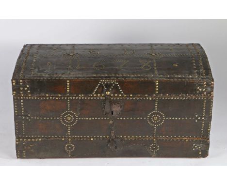 17th Century leather clad trunk, circa 1678, the slighted domed top with stud work line decoration, initialled ED and dated 1