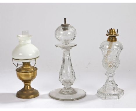 Brass oil lamp with clear glass chimney, white glass shade above a brass reservoir and foot, 23.5cm high, moulded glass oil l