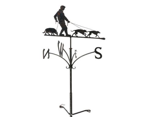 Metal weather vane, with a man with his dog, N.S.E.W. by blacksmith Graham Chaplin, 179cm long&nbsp;