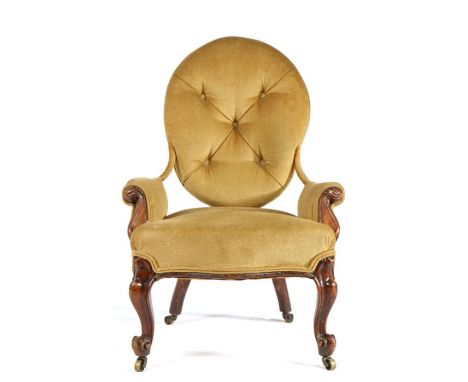 Victorian mahogany armchair, of small proportions, the oval pad button back above a stuff over seat and flanked by scroll arm